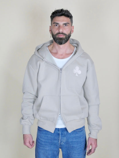 Hoodie zippé épais monsieurbarr en coton lourd 440 GSM, coupe ample, avec grand trèfle iconique Blanc Corfou sur fond pierre calcaire